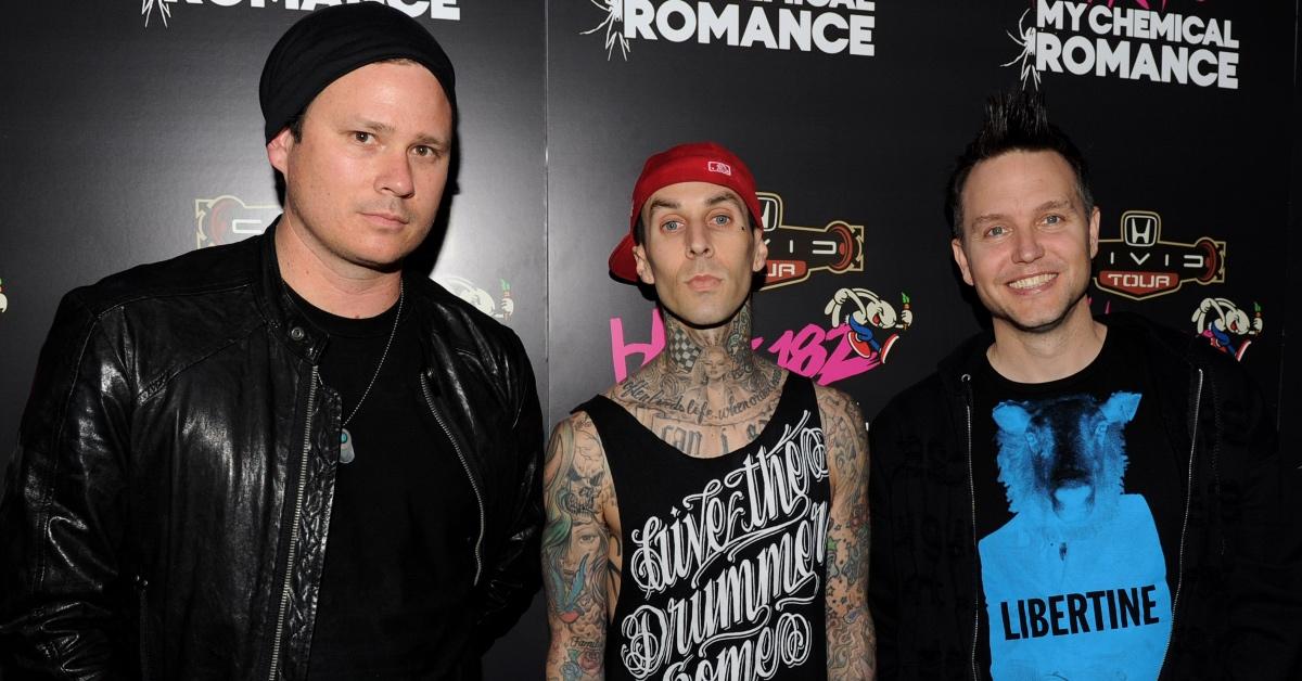 Tom DeLonge, Travis Barker, and Mark Hoppus of Blink-182 posing