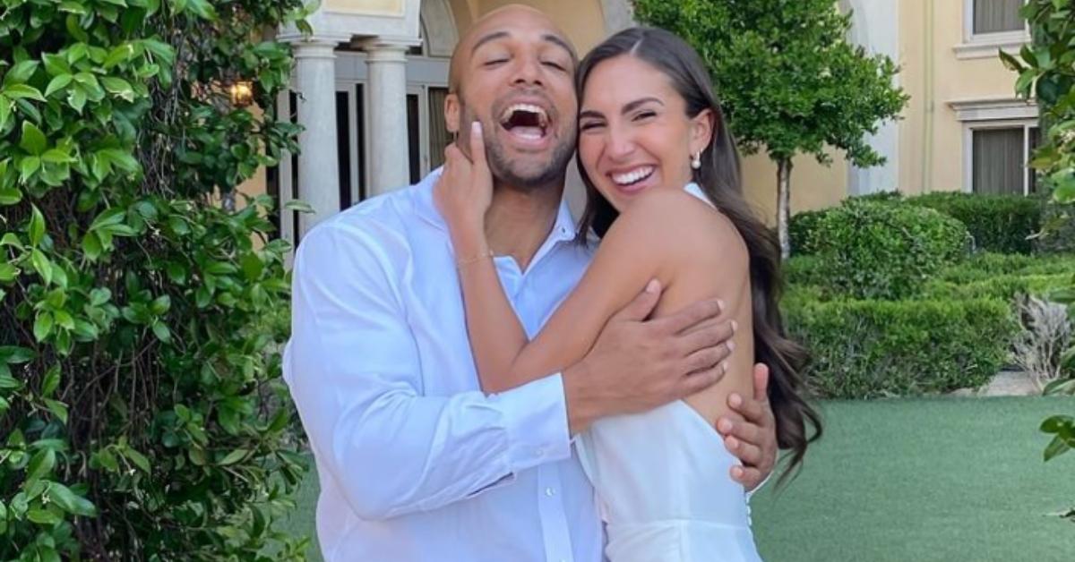 Austin Ekeler and Melanie Wilking post for pictures the weekend of their wedding