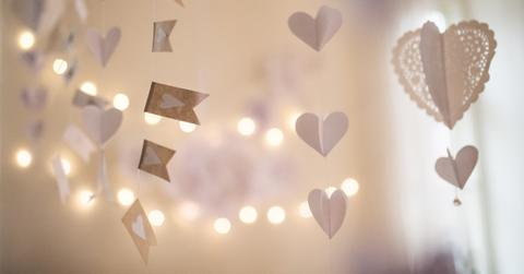A white garland and lights festive background.