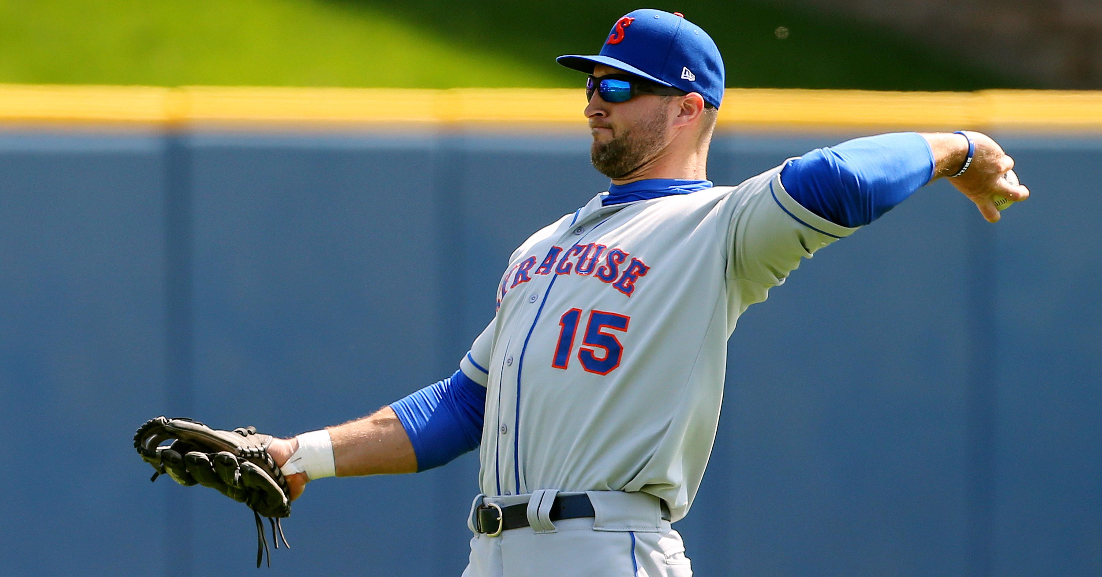 Tim Tebow shows some power during baseball tryout