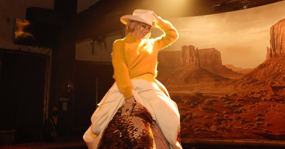 Sydney Sweeney rides a bull while attending Tom Ford's afterparty.