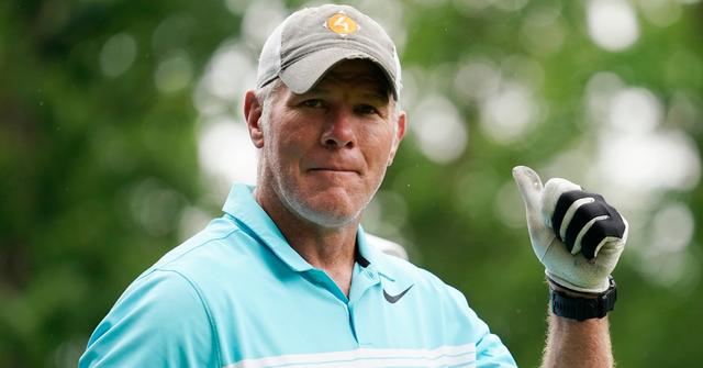 Former NFL player Brett Favre walks off the 10th tee box during the Celebrity Foursome.