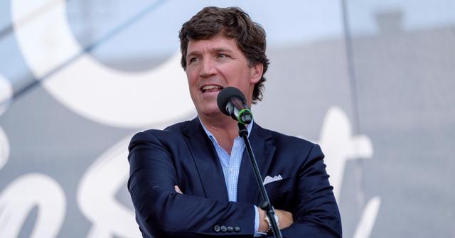 Tucker Carlson speaks during a conservative festival in Hungary on Aug. 7, 2021.