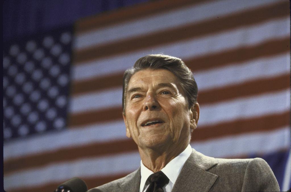 Ronald Reagan in front of the American flag