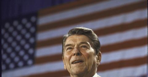 Ronald Reagan in front of the American flag