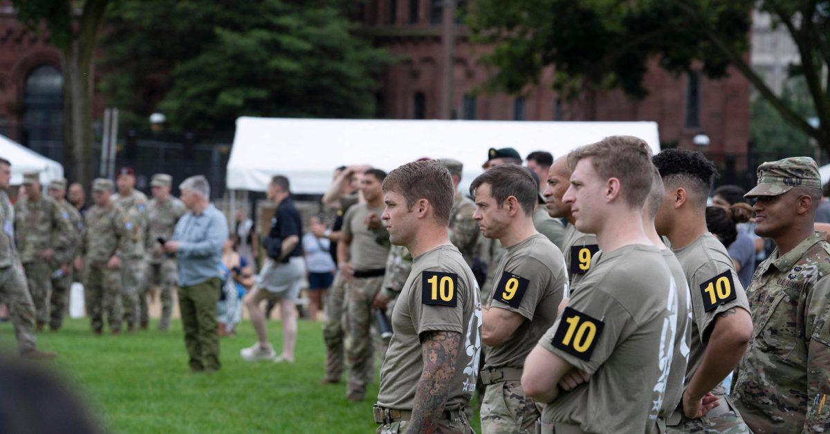 U.S. Army men engaging in friendly competition.