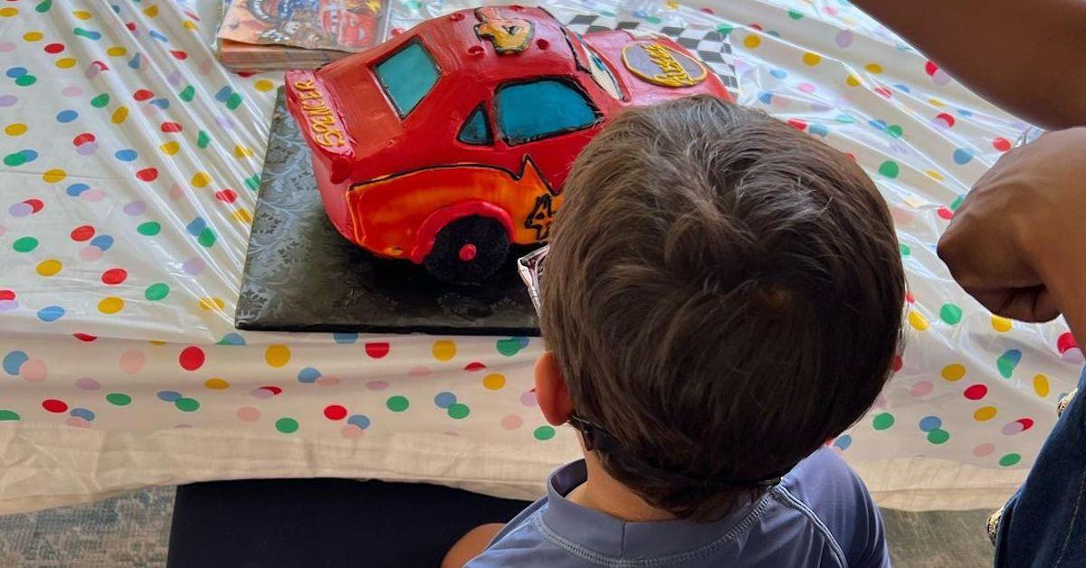 Mindy Kaling's son Spencer gazes at his Cars birthday cake