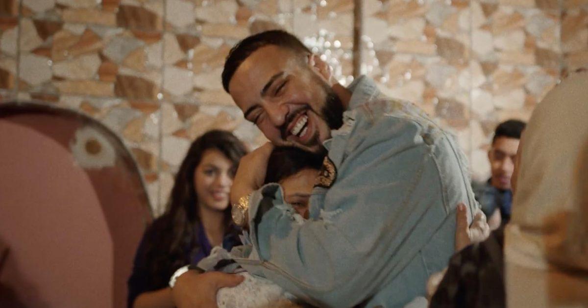 French Montana hugging his mom.
