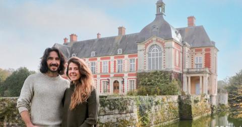 Daphne Reckert and Ian Figueira in front of the castle she inherited in France.