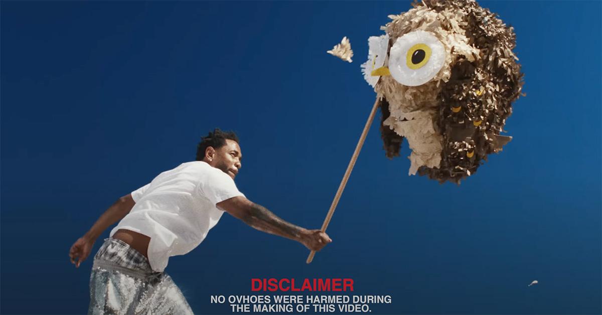 Kendrick Lamar hitting an owl pinata. 