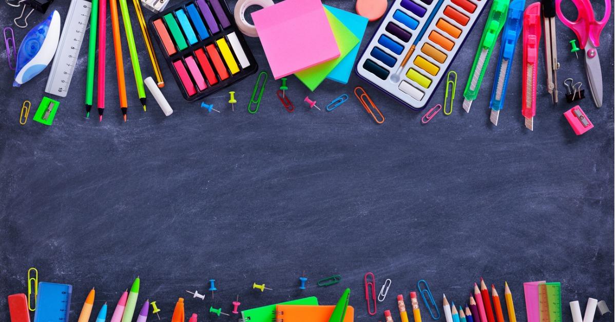 school and office supplies on blackboard picture id