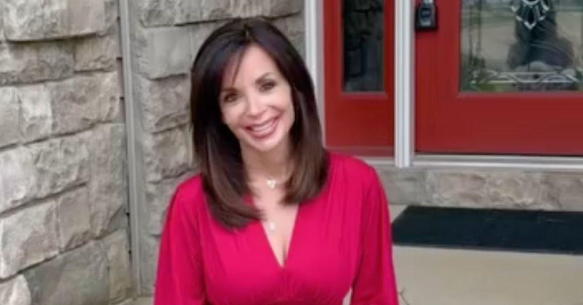 Hollie Strano sitting on a front step. 