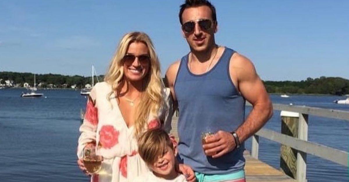 Brad Marchand and his wife and kid by the water.