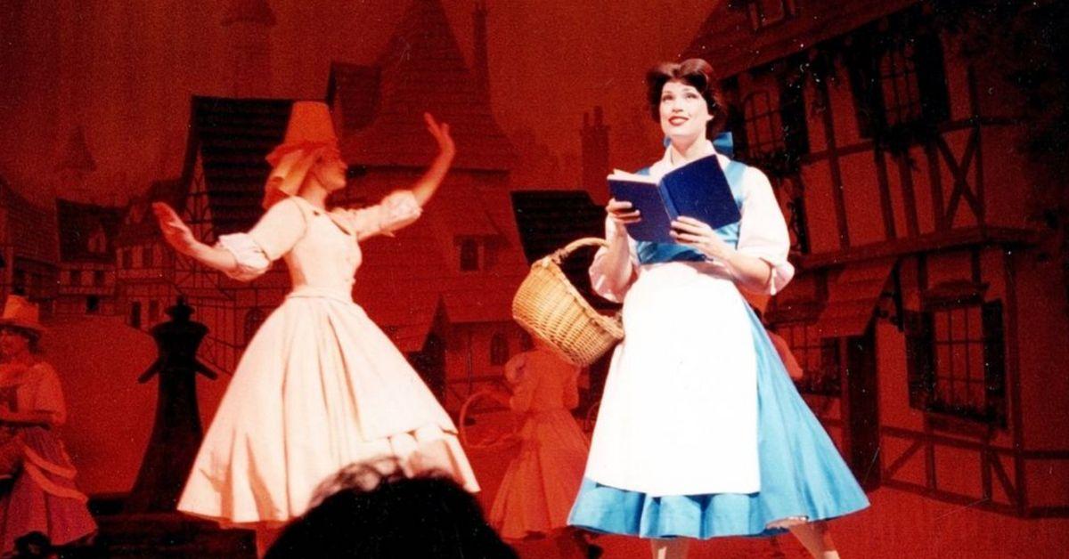 Britani Bateman onstage as Belle in a theatrical production of Disney's 'Beauty and the Beast'