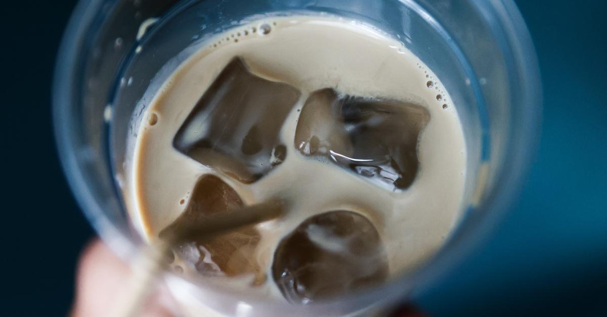 A Starbucks iced coffee that isn't filled to the top of the cup