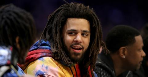 J. Cole talking on the sidelines at the 2019 NBA All-Star Game