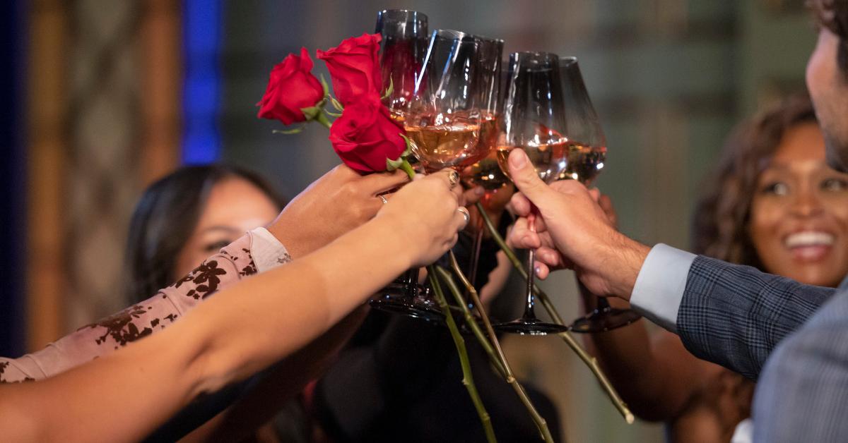 Joey and his remaining ladies clink glasses during Season 28 of 'The Bachelor.'