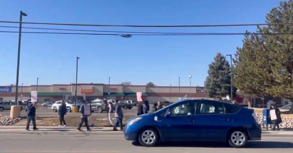 Employees striking outside a King Soopers location. 