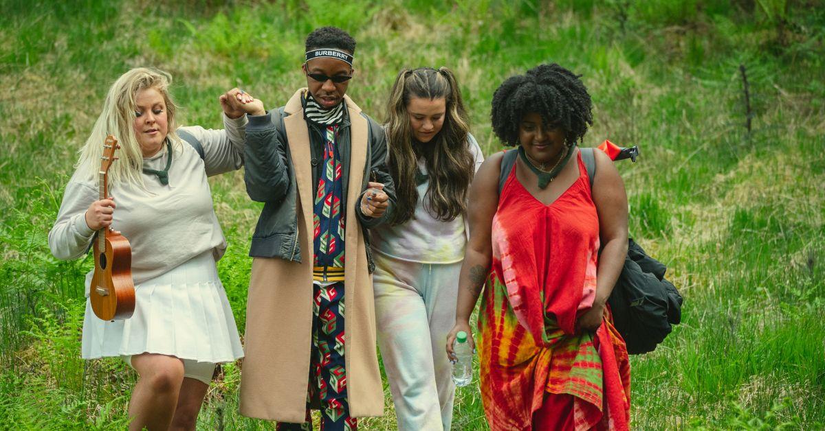 (l-r): Rae Hume, Solomon, Olivia Lagaly, and Darriea Clark walking outside while filming 'Snowflake Mountain.'