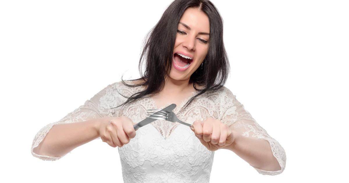 angry bride with knife and fork picture id