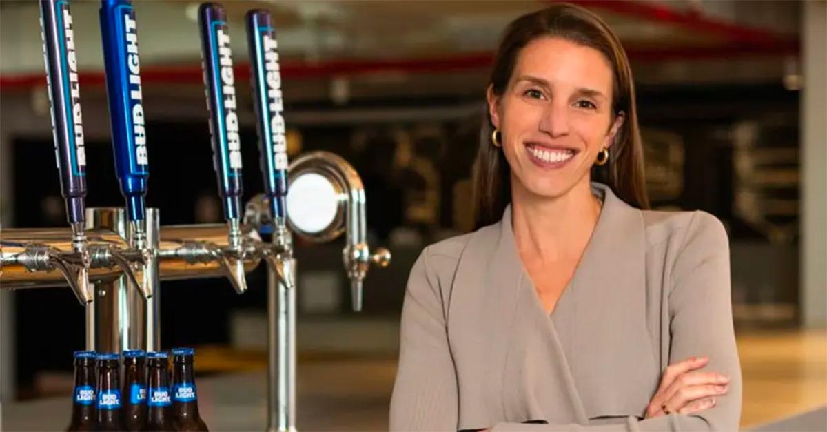 Alissa Heinerscheid posing in front of a tap. 