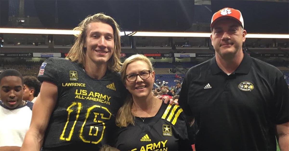 Trevor Lawrence standing with his parents. 