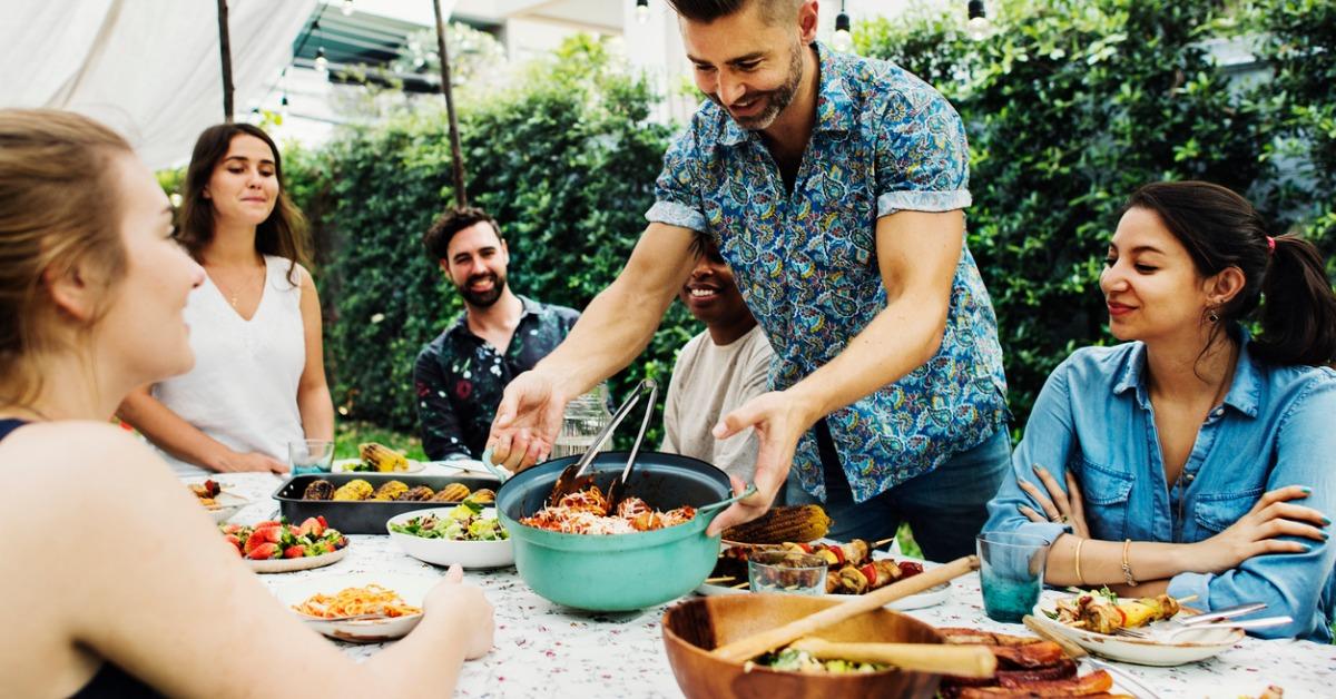group-of-diverse-friends-enjoying-summer-party-together-picture-id935280904-1542303738575-1542303740509.jpg