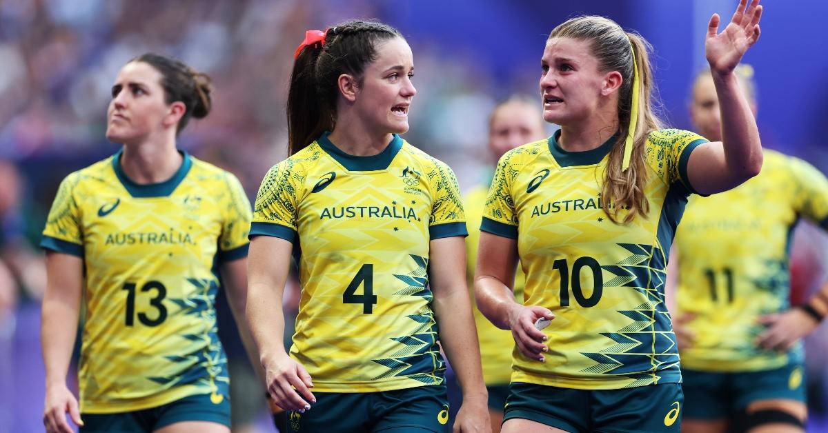 PARIS, FRANCE - JULY 30: Dominique Du Toit #4 and Isabella Nasser #10 of Team Australia look dejected following defeat during the Women's Rugby Sevens Bronze medal match between Team Canada and Team Australia on day four of the Olympic Games Paris 2024 at Stade de France on July 30, 2024 in Paris, France. (Photo by Cameron Spencer/Getty Images)