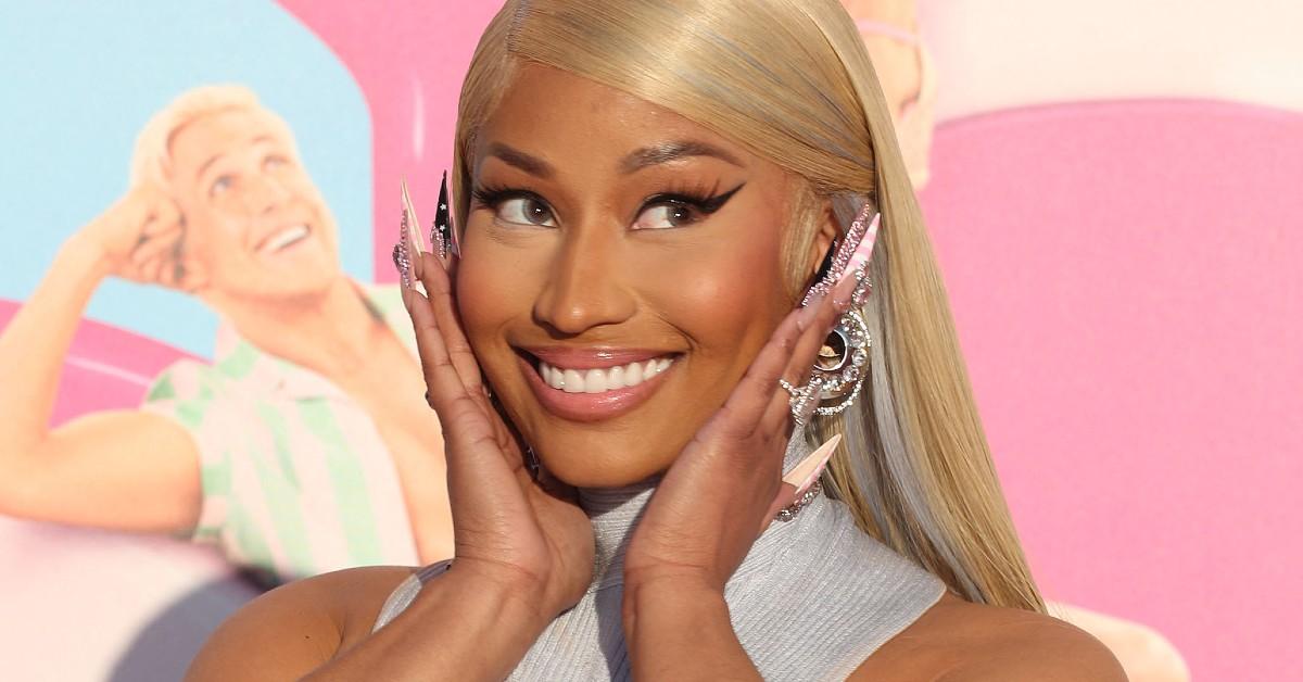 Nicki Minaj smiling and posing for the camera
