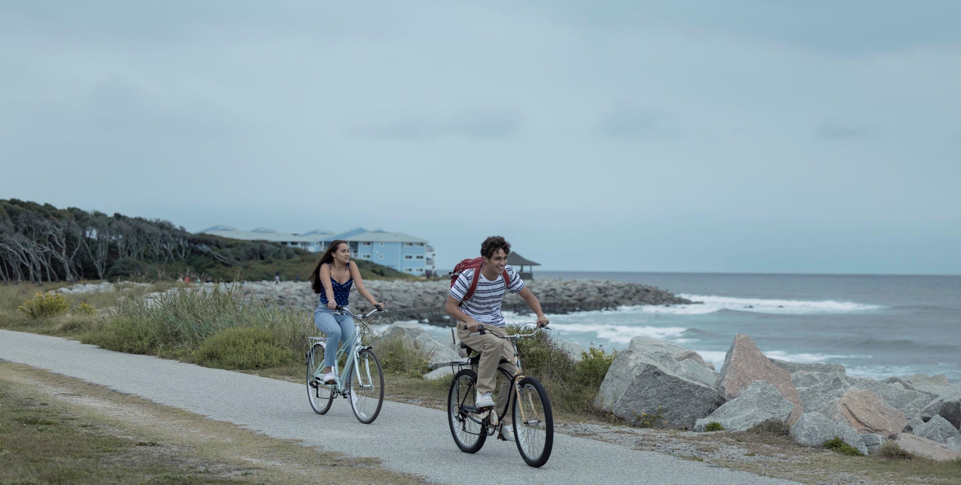 Belly riding her bike through Cousins Beach.