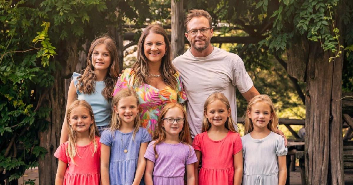 Adam Busby, his wife, and their kids.