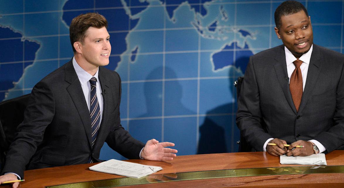 Colin Jost and Michael Che hosting "Weekend Update" segment on 'SNL'.