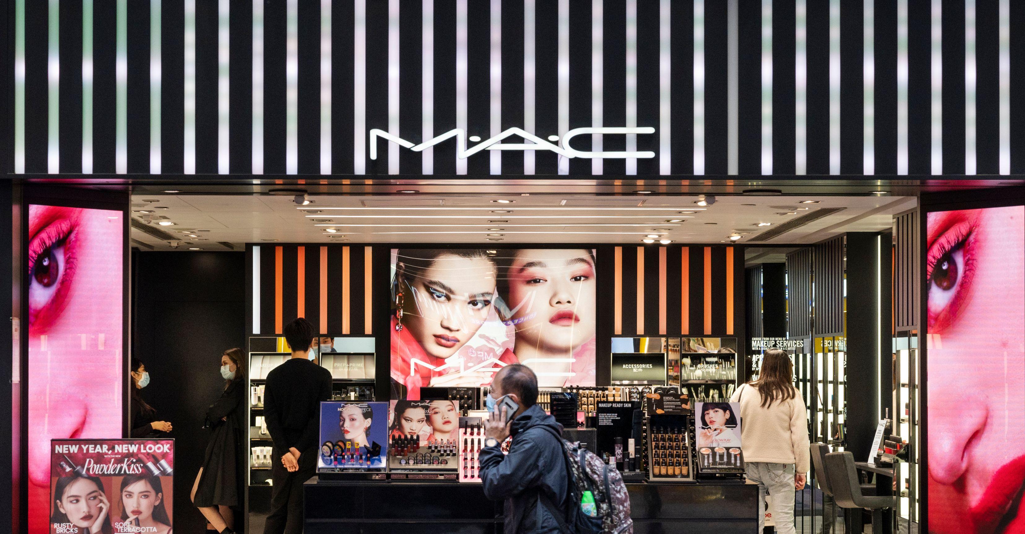 A pedestrian walks past the Canadian MAC Cosmetics store seen in Hong Kong.