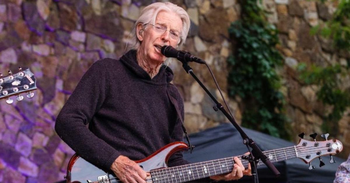 Phil Lesh plays bass guitar at an event