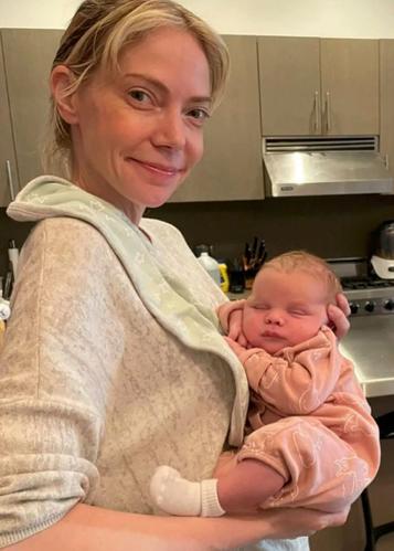 Liki Lindhome holding son Keaton