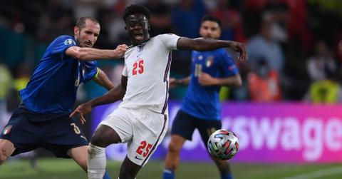 Giorgio Chielli and Bukayo Saka at the UEFA Euro 2020 final