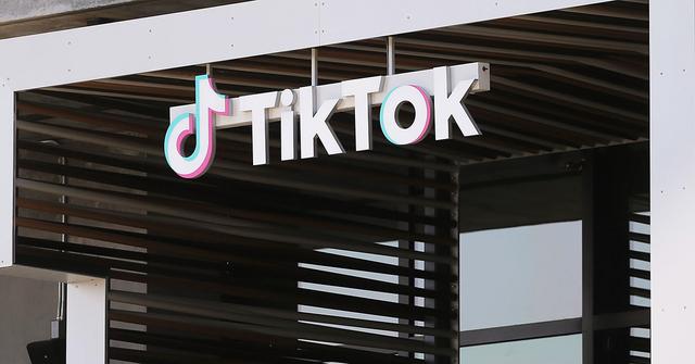 The TikTok logo on the side of a building.