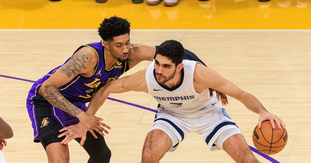 Lakers center Christian Wood and Grizzlies player Santi Aldama