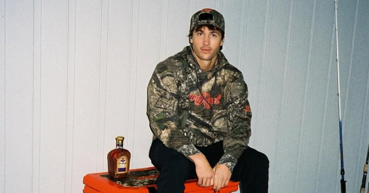 Rob Rausch posing for his Crown Royal X Realtree partnership