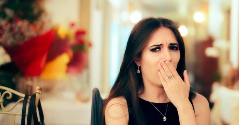 sleepy bored girl at new year party yawning picture id