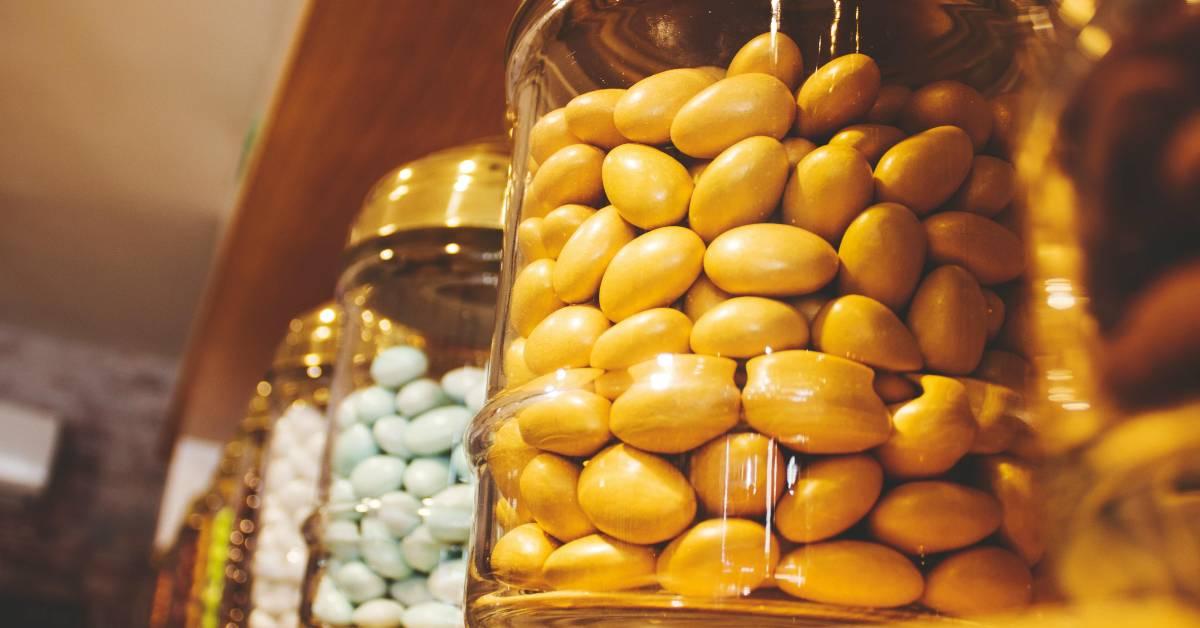 Candy stored in glass jars on a shelf