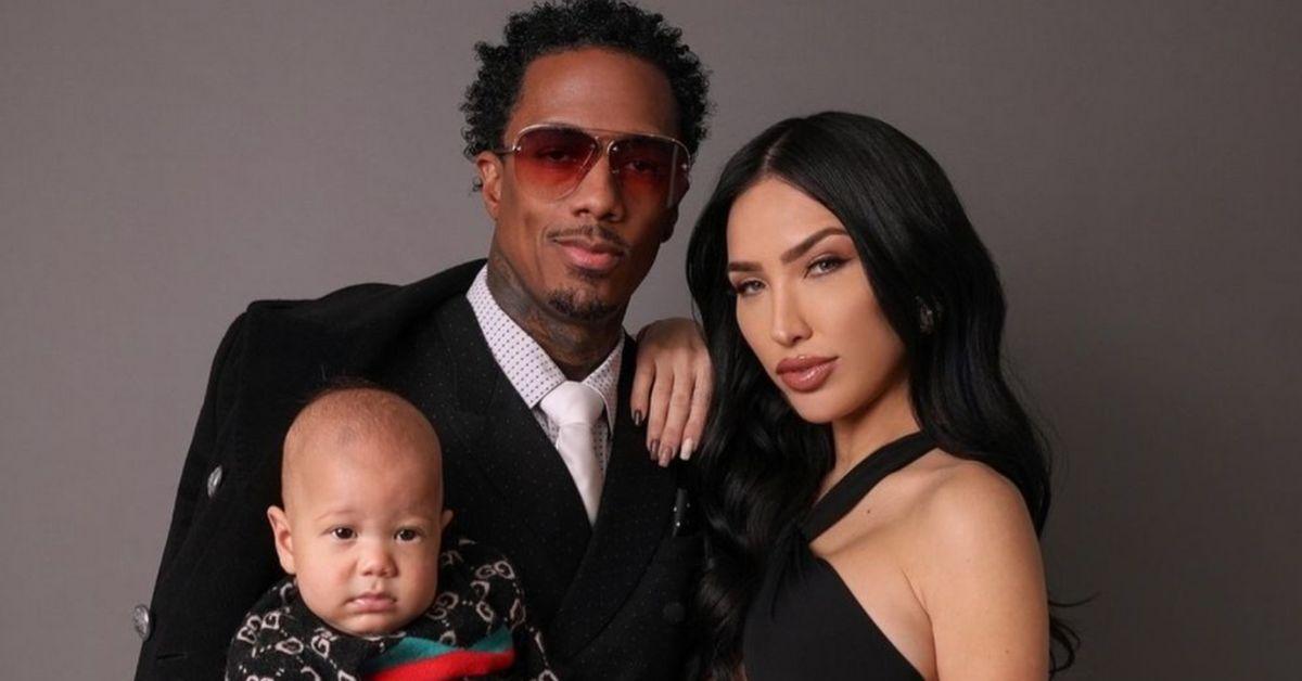 Nick Cannon and Bre Tiesi pose for a photo together with their son Legedary Love.