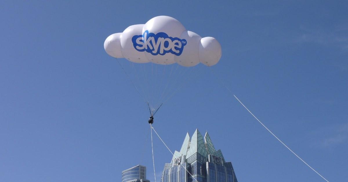 Skype logo on a floating balloon.