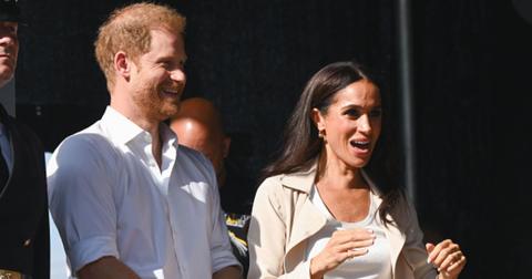 Prince Harry, Duke of Sussex and Meghan, Duchess of Sussex attend the swimming medal ceremony during day seven of the Invictus Games Düsseldorf 2023