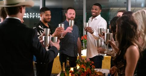 The contestants on 'The Ultimatum' raise a glass.