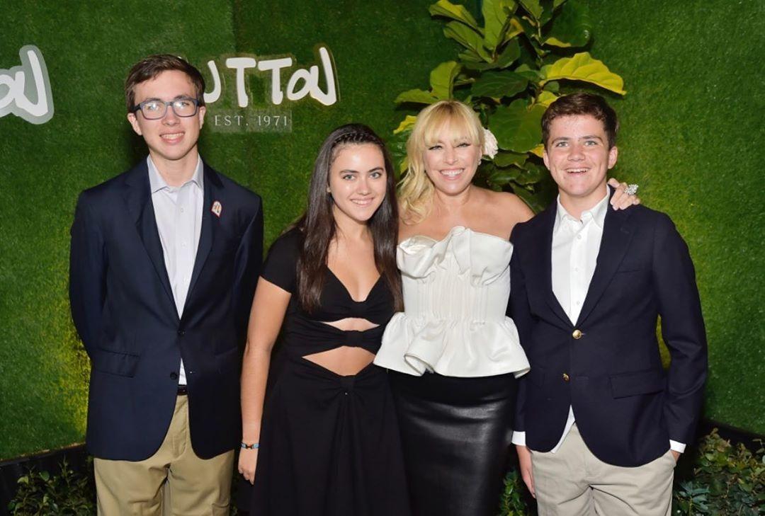 (l-r): Sutton Stracke's son, her daughter, Sutton Stracke, and her other son