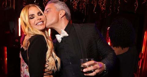 Todd kissing Alexia Nepola on the cheek