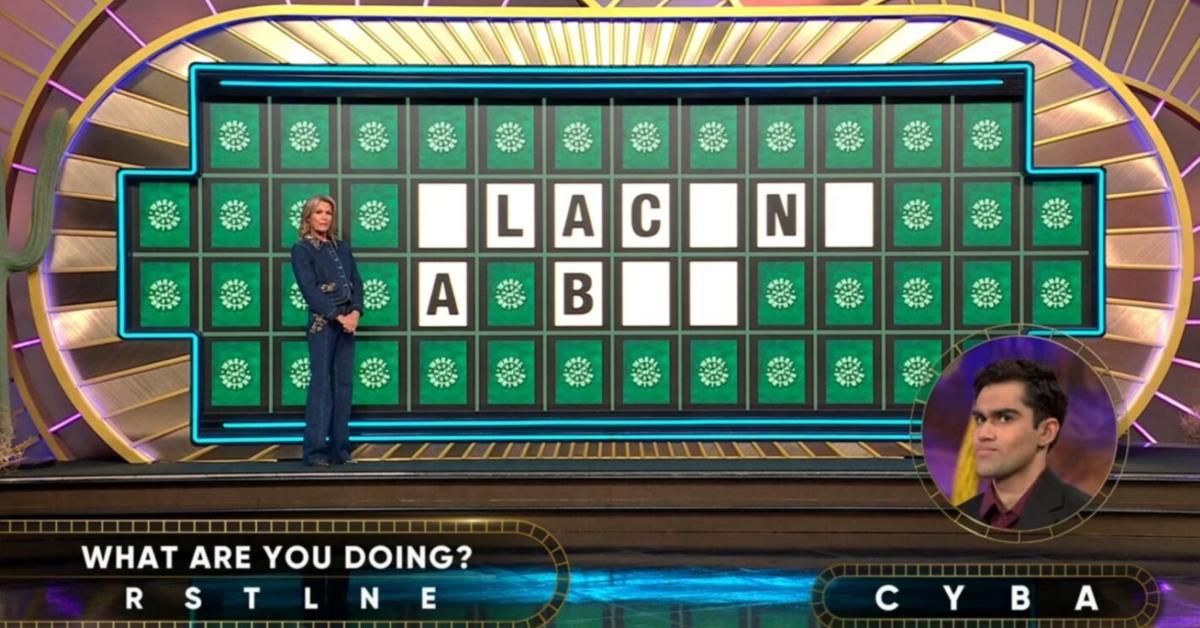 Raul tries to figure out the puzzle on Wheel of Fortune.