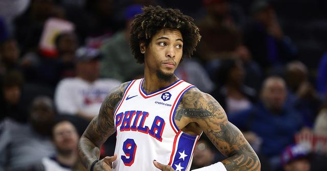 Kelly Oubre Jr. in a 76ers uniform playing the Pistons.