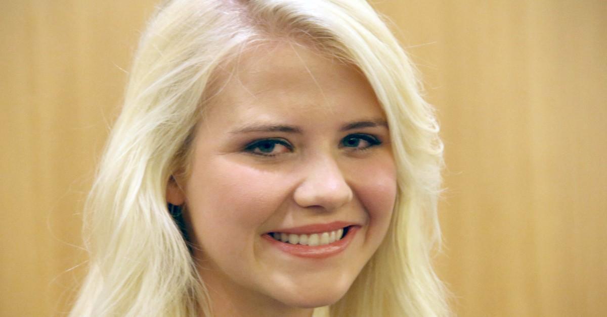 Elizabeth Smart smiling at a book signing